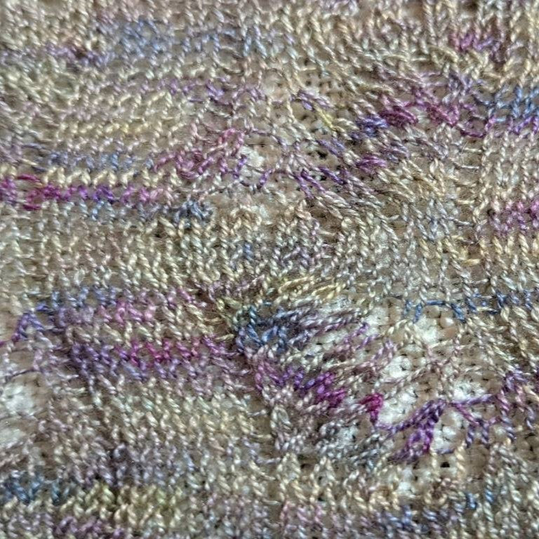 Hand-knitted feather stitch lace scarf