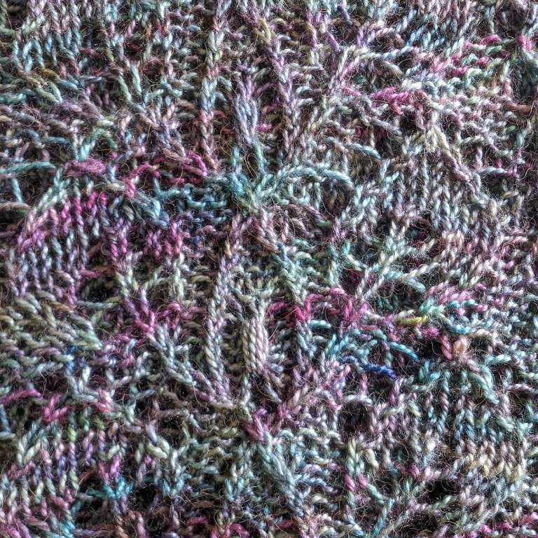 Leaves and crossing stems pattern hand-knitted lace