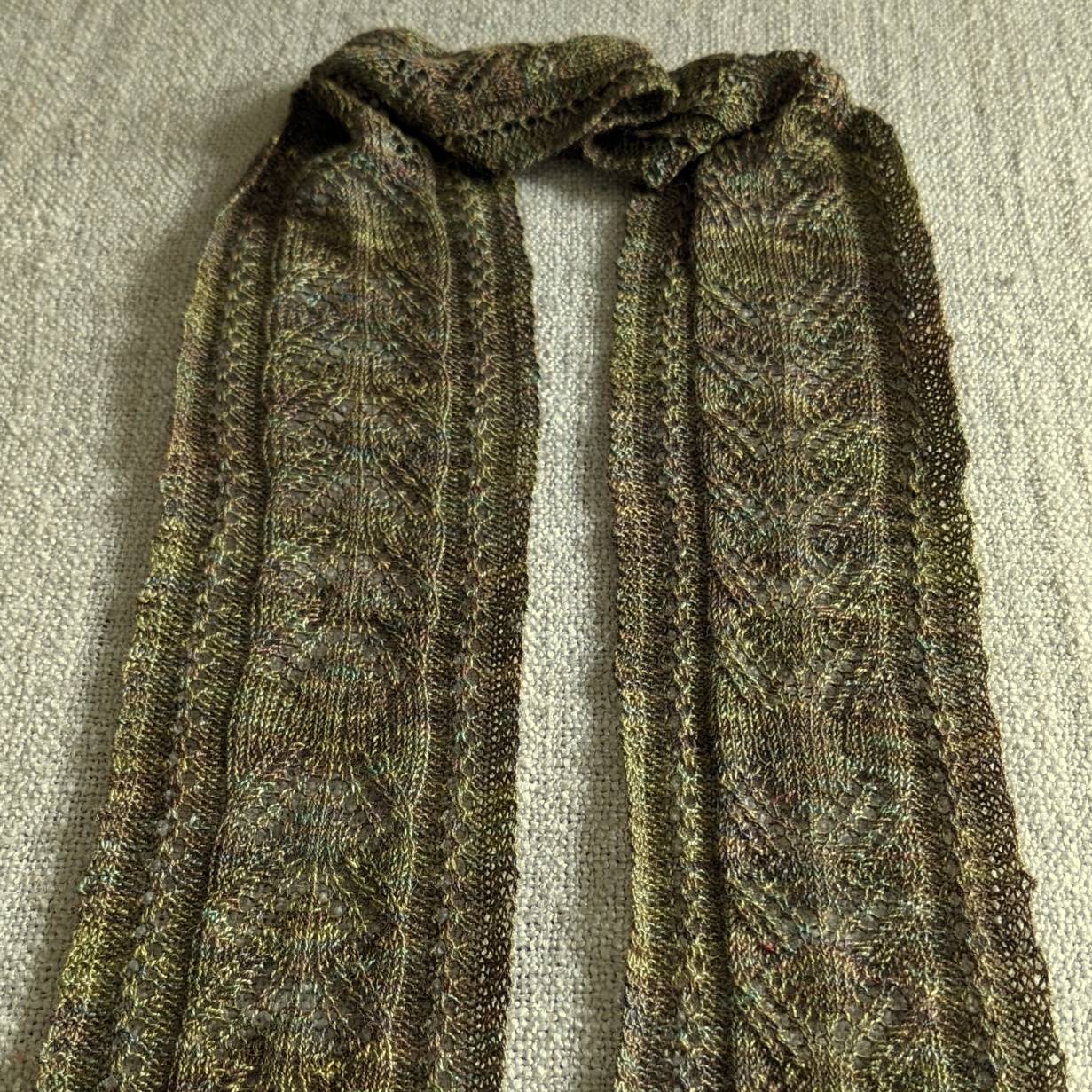 Narrow lace hand-knitted scarf