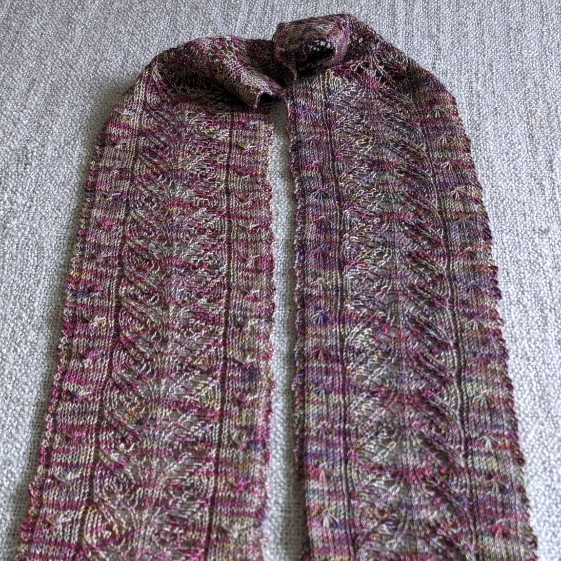 Narrow lace hand-knitted scarf