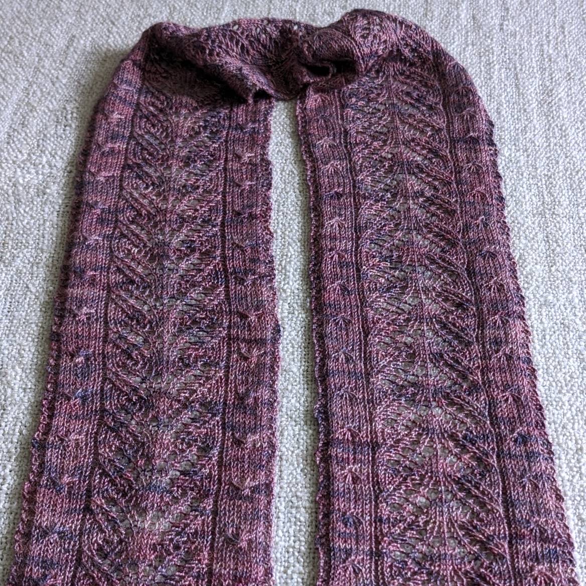 Narrow lace hand-knitted scarf