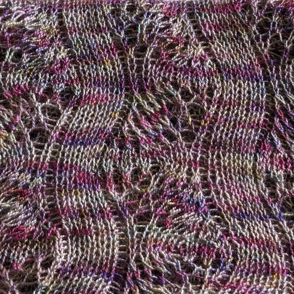 Hand-knitted feather stitch lace scarf