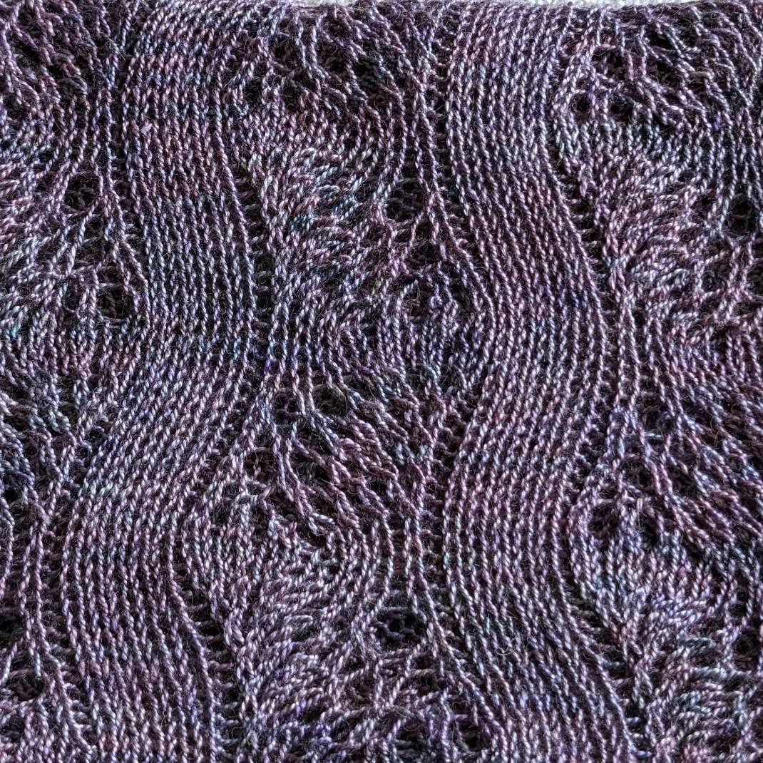 Hand-knitted feather stitch lace scarf